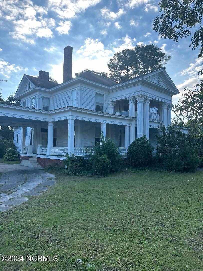 This exquisite Victorian house, built in 1912, is a remarkable blend of historical charm and modern comfort. With five spacious bedrooms, it offers ample room for family, guests, or a creative home office. The expansive dining room serves as a perfect backdrop for gatherings, where you can host memorable dinners and celebrations.

Every corner of this home showcases stunning trim work and intricate detailing, including large 10ft sliding pocket doors separating the dining, living room and parlor for those intimate conversations or quiet time.  This home reflects the craftsmanship of its era., from decorative moldings to elegant staircases, the architecture tells a story of timeless beauty. Imagine sipping tea in the sunlit parlor or enjoying cozy evenings in the inviting living spaces or on the second story balcony.

This Victorian house isn't just a home; it's a piece of history waiting for you to add your own chapter. Whether you're looking to restore its original glory or infuse it with your personal style, this property offers endless possibilities to create a sanctuary that resonates with character and warmth.  House is priced to sell '' As Is'' allowing you to restore it to its original beauty.
