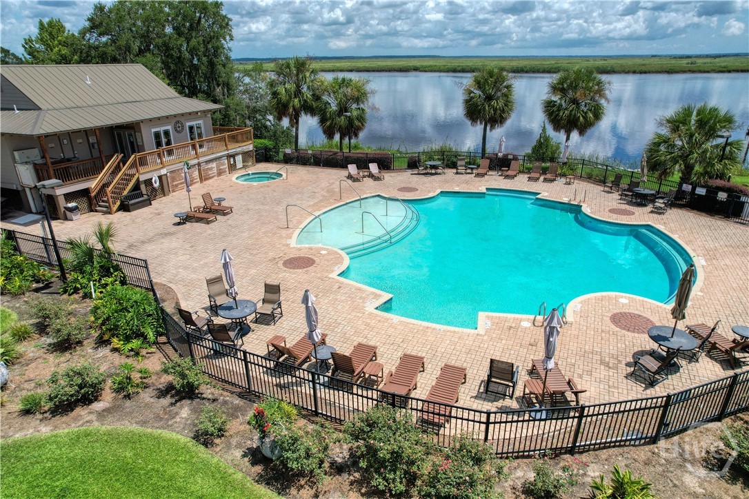 Overhead view of the swimming pool, jacuzzi, and fitness center