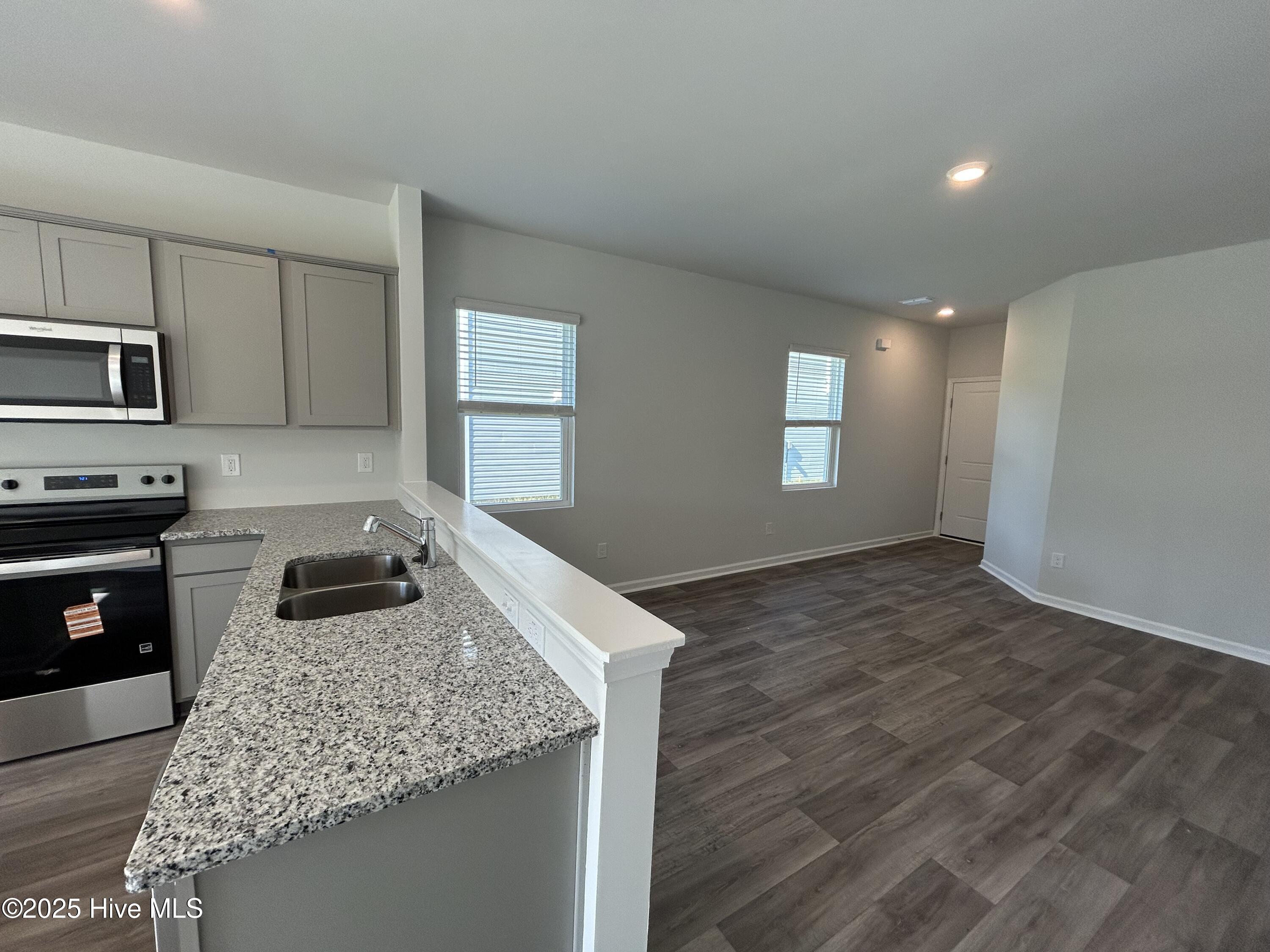 568 Coronado Avenue SE 16, Leland, NC 28451 – photo 10: Kitchen & Gathering Space