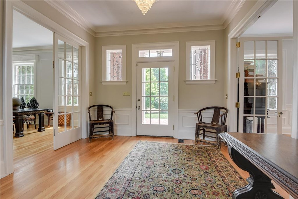 Large foyer flanked by French doors