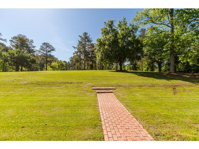 This Path Takes You to Your Large Front Yard.