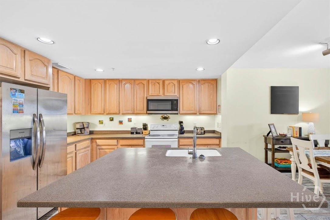 Large central island with wine storage