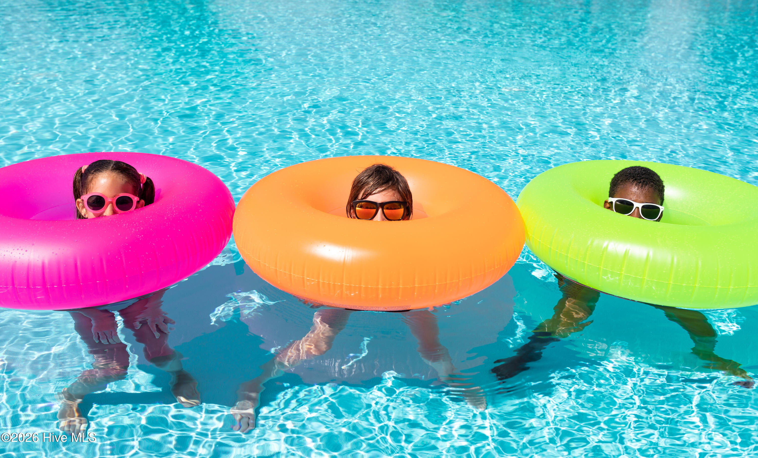 3 Kids in Pool with Floats, All Races