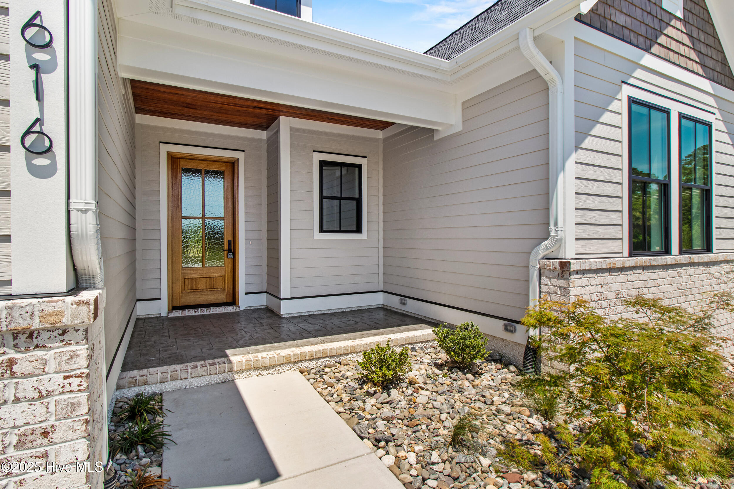 Mahogany front door and porch ceiling!