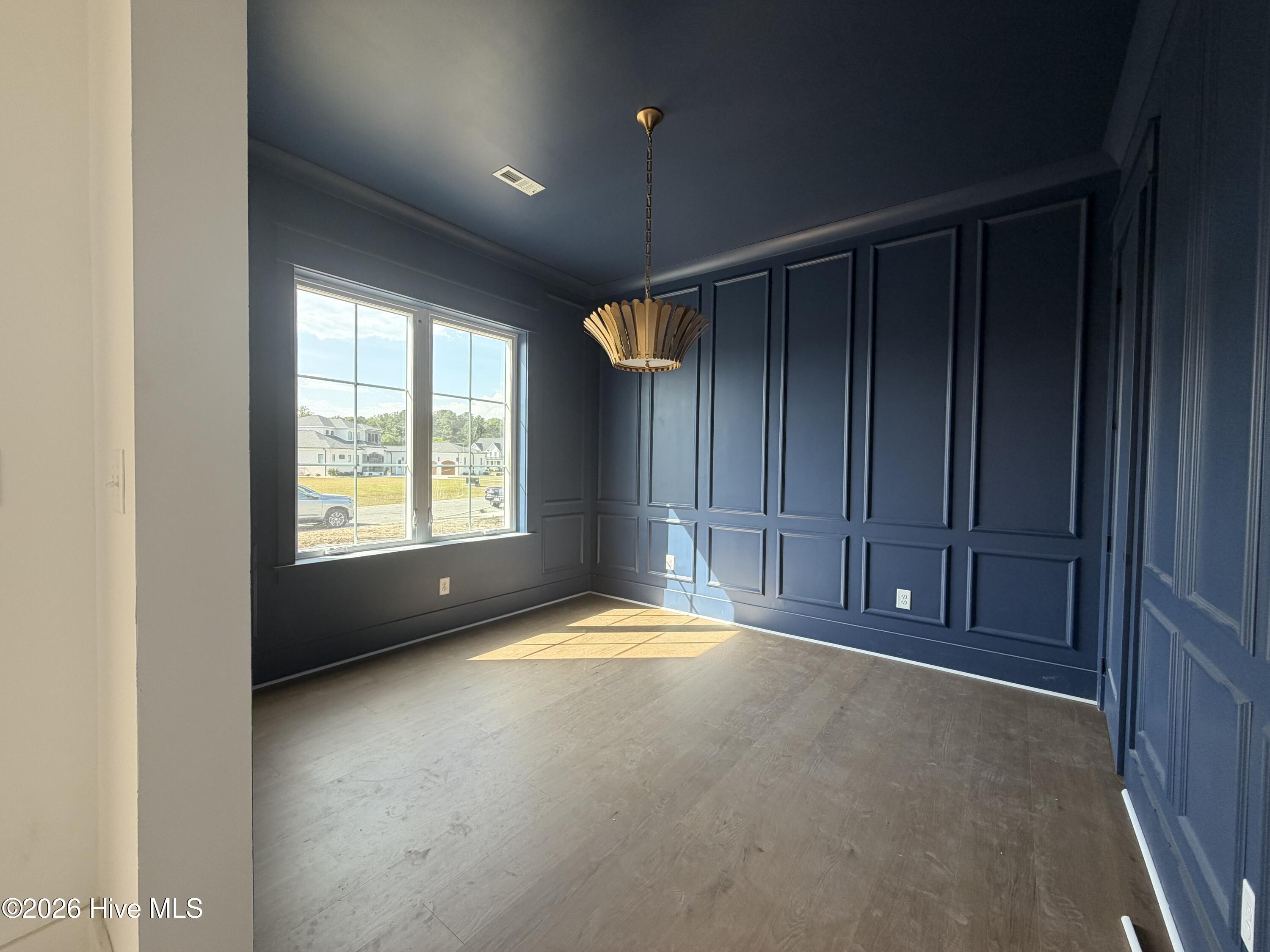 this study- office is saturated with color and natural lighting