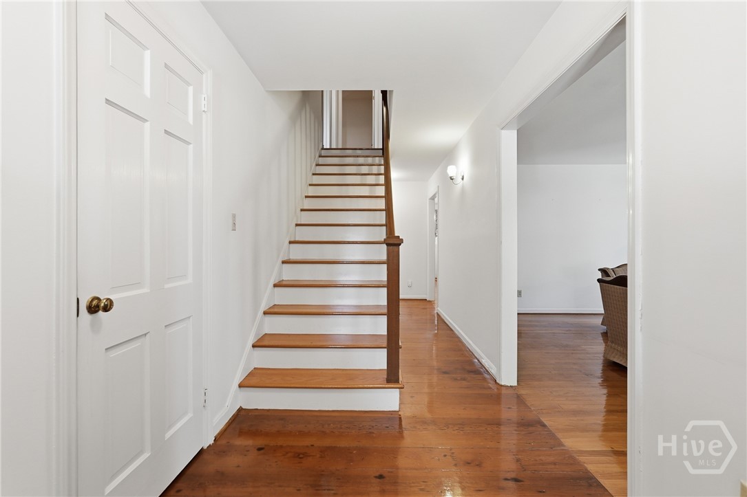 welcoming entry with heart pine flooring