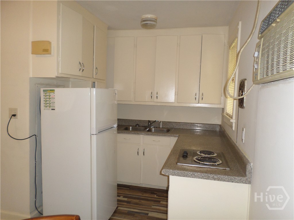 Kitchen with refrigerator