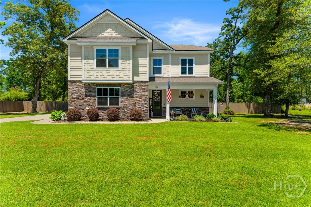 Located in the highly sought-after gated community of Ramsey Landing, this beautifully maintained 4-bedroom, 2.5-bath home offers 2,698 square feet of thoughtfully designed living space on a rare 0.75-acre homesite. Built for both everyday living and entertaining, the open-concept floor plan seamlessly connects the spacious living room, dining area, and kitchen, creating a bright and inviting atmosphere throughout.The kitchen is the heart of the home, featuring quartz countertops, a large center island with seating, abundant cabinet space, a pantry, and plenty of room to gather. The main-level primary suite provides a private retreat with a spacious walk-in shower, dual vanity, and generous walk-in closet. Upstairs, you'll find three additional bedrooms, a full bathroom, and an oversized loft perfect for a media room, home office, playroom, fitness area, or second living space.Step outside to enjoy one of this home's standout features—a fully fenced backyard on an expansive three-quarter-acre lot, offering endless possibilities for outdoor entertaining, recreation, pets, gardening, or even a future pool.Additional features include a dedicated laundry room, two-car garage, ample storage, modern finishes, and a functional layout designed to fit today's lifestyle.Residents of Ramsey Landing enjoy the privacy and security of a gated community while remaining conveniently located near top-rated Effingham County schools, shopping, dining, Gulfstream, the Hyundai Meta Plant, the Port of Savannah, Savannah/Hilton Head International Airport, and Historic Downtown Savannah.Combining generous indoor living spaces, an oversized homesite, modern finishes, and an unbeatable location, this move-in-ready home offers a rare opportunity to enjoy the best of Effingham County living.