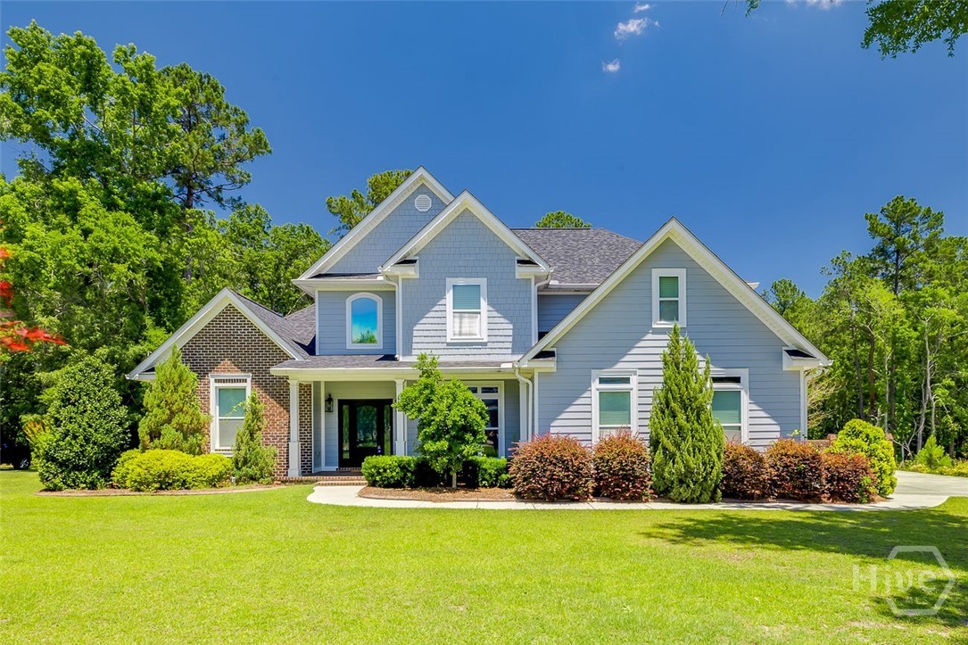 Welcome to Kate’s Cove, where custom craftsmanship, timeless design, and peaceful surroundings come together on over an acre of beautifully landscaped property. This stunning 4-bedroom, 3.5-bath executive home offers more than 3,600 square feet of thoughtfully designed living space, featuring a luxurious main-level owner’s suite, soaring two-story great room, and elegant finishes throughout. The gourmet kitchen is the heart of the home, complete with granite countertops, stainless steel appliances, an oversized island, and seamless flow into the keeping room with a double-sided fireplace. Upstairs, spacious secondary bedrooms and additional baths provide room for family and guests alike. Step outside to enjoy the screened porch and open deck overlooking a private, wooded backyard—perfect for relaxing evenings or entertaining year-round. Situated on a 1.17-acre lot in one of Rincon’s most desirable neighborhoods, this exceptional property combines privacy, comfort, and upscale living just minutes from shopping, dining, and Effingham County schools.