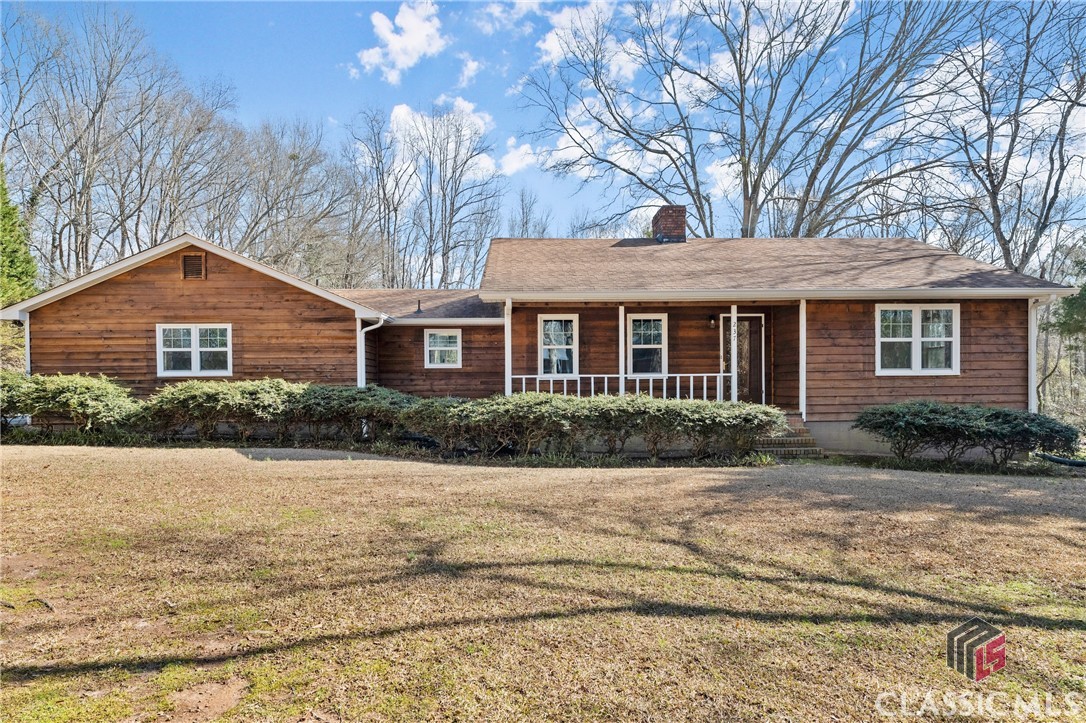 First time on the market for this charming three-bedroom, two-bathroom ranch. This home has undergone recent updates, making it a perfect blend of modern comfort and classic appeal. Step inside to discover new LVP flooring that adds a touch of elegance, complemented by fresh paint throughout that creates a bright and inviting atmosphere. The open living areas are enhanced by new recessed lighting, providing a warm, bright, and contemporary ambiance. Natural light floods through the new energy-efficient windows, creating a seamless connection with the outdoors. When you’re ready to unwind, step out onto the enclosed porch and indulge in a good book or cup of coffee while overlooking your private oasis. There you will find a beautiful in-ground swimming pool, perfect for relaxing and entertaining on our warm Georgia days. The liner and pool filter are less than two years old ensuring many years of enjoyment. The generously sized workshop is a handy addition, offering space for DIY projects or extra storage. Situated on a level, 1+ acre lot, this home is nestled in a quiet residential area, ensuring tranquility and privacy, all while convenient to the heart of Commerce - schools, downtown shopping, and much more. Don't miss the opportunity to make this updated ranch yours – a perfect combination of comfort, style, and outdoor amenities. Welcome to a lifestyle of relaxation and enjoyment in Commerce, Georgia!
