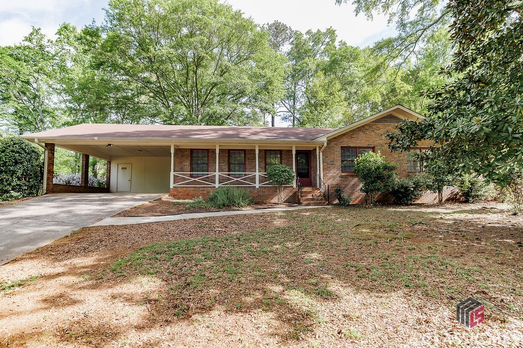 Excellent University Heights ranch with a large, fenced yard. New water heater in 2024. Fresh interior paint. Eat-in kitchen features concrete countertops. Laundry room. Bathrooms feature original vintage tile. Hardwood flooring throughout most living areas and all bedrooms. Bright sunroom overlooks large backyard.