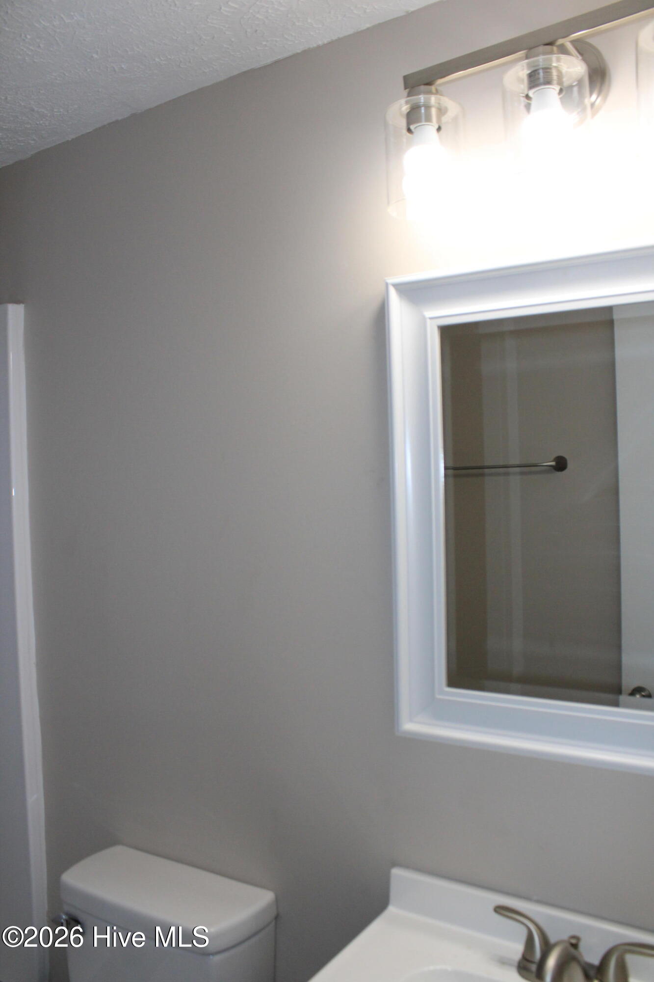 Upstairs Bathroom. New Tub , Vanity, Plumbing Fixt & Light Fixtures