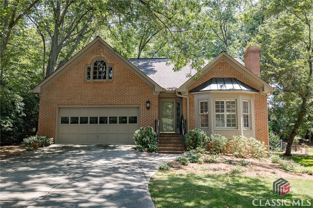 Welcome to 115 Woodhaven Terrace, a charming brick home nestled on a quiet cul-de-sac in popular Woodhaven subdivision. Three spacious bedrooms, 2 upstairs each with private vanity area. Oversized Primary suite is located on main. Additional features include: hardwood floors, ample natural light, and a modern kitchen adorned with quartz countertops, a gas cooktop, and a Bosch dishwasher. Screened in porch off of the kitchen looking out to the large fenced yard. Take advantage of the neighborhood amenities, including a sparkling pool and tennis courts, perfect for staying active and connecting with neighbors. With its prime location, this home is just a short distance from grocery stores and shopping. Embrace the comfort and convenience of this incredible property, complete with a two-car garage for parking and storage. Don't miss the opportunity to make 115 Woodhaven Terrace your forever home in Athens, GA. Schedule a showing today!