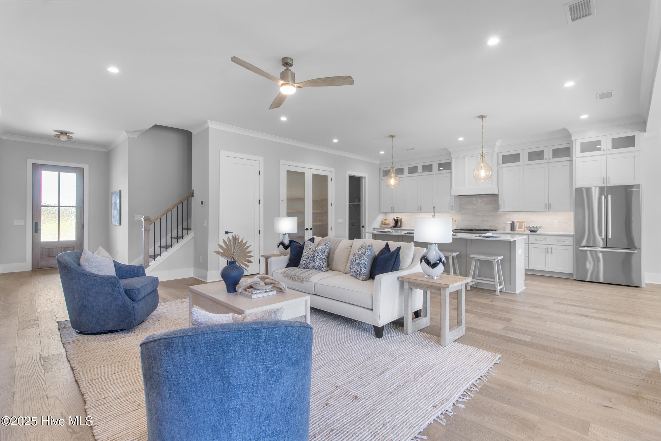 Large open living space with all wood flooring