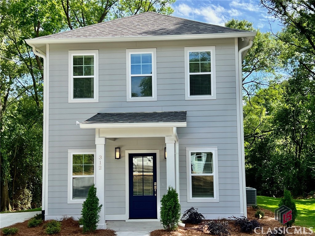 Under Contract before published. In-town New Construction by Award-Winning J W York Homes, this 2-story 4/3 home is scheduled for completion by late May, 2024. It sits on a .27 acre lot tucked behind a 3/2 historic cottage ( also available for sale ) at 326 Arch Street, accessed by a shared driveway easement, thus is somewhat privately tucked away off the street, and the associated traffic. The house plan features 3 bedrooms/2 baths upstairs, including a Master suite. on the main level, there's a 4th BR and 3rd full bath. Additionally, there's an open common living area that includes a stylish kitchen with island, pantry, quartz countertops/tile backsplash, stainless electric range, dishwasher, and microwave. The LR & DR are open to kitchen, and a hallway leads to a private back porch.