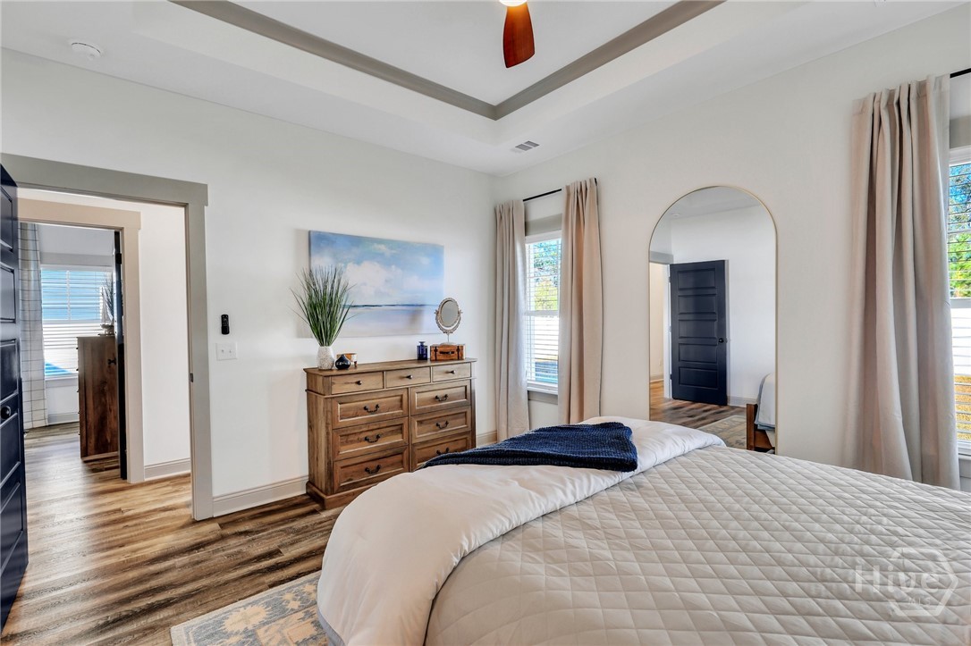 PHOTOS OF A PREVIOUSLY BUILT BRINSON PLAN BY LAWRENCE ALEXANDER HOMES.