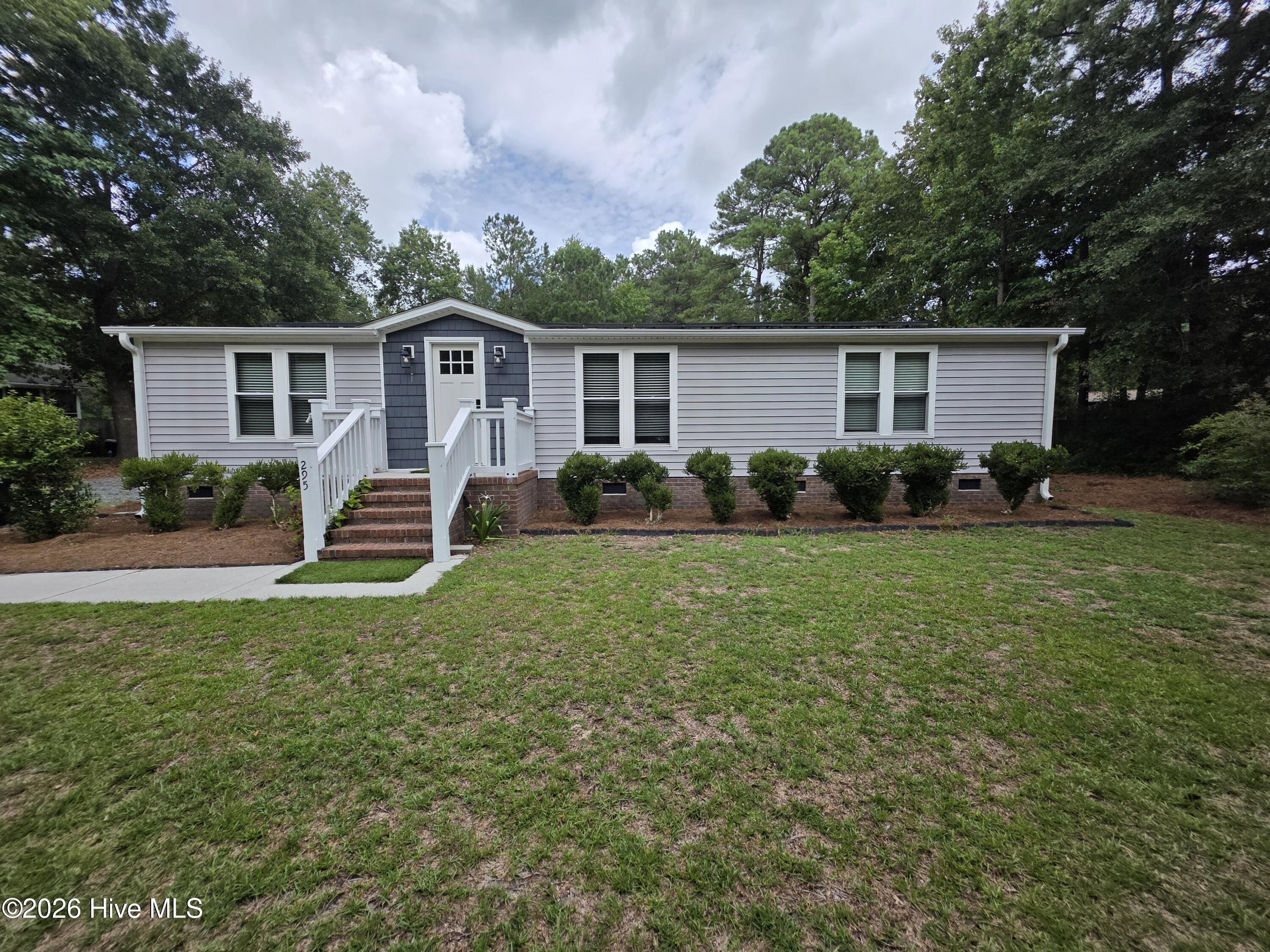 Exterior photo of 295 Groves Point Circle, Hampstead, NC 28443. MLS: 100592795