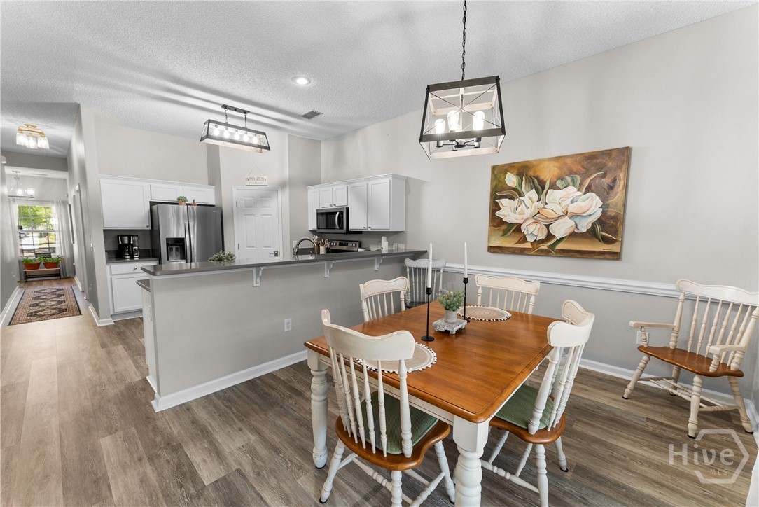 dining room open to kitchen & living room
