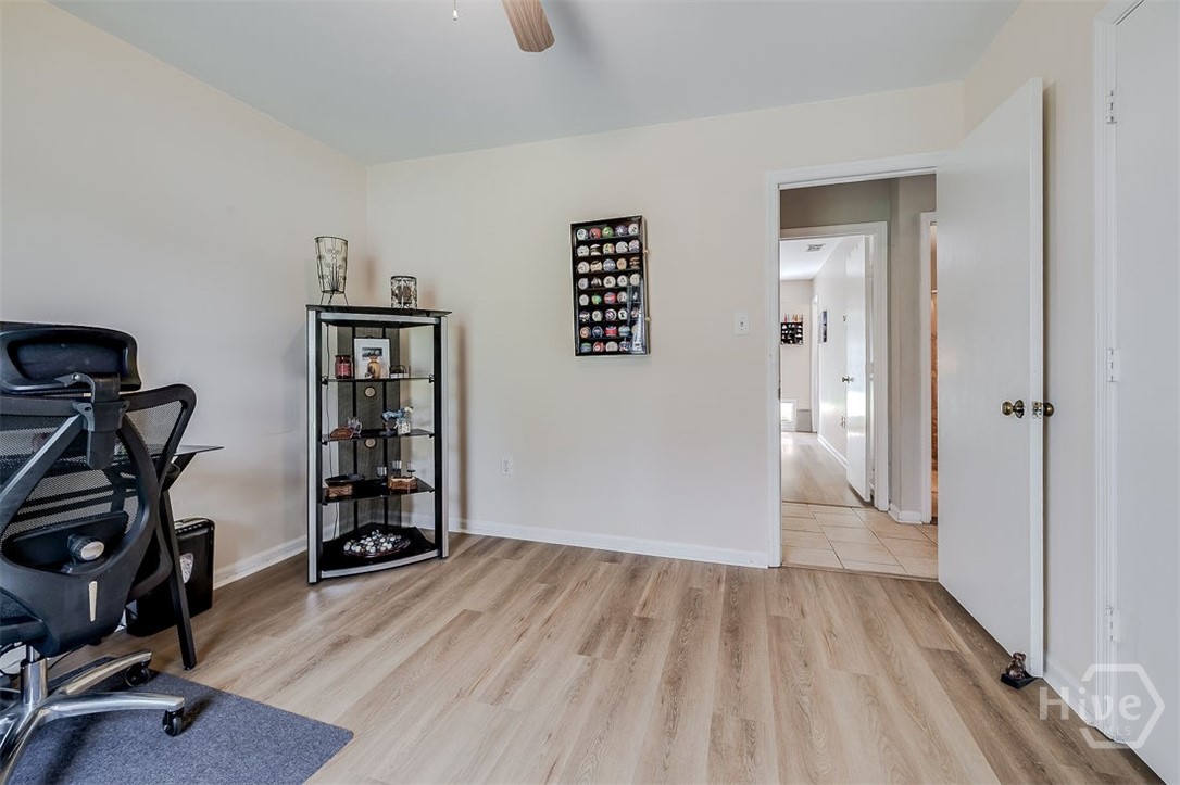 This room also has new LVP flooring and a ceiling fan
