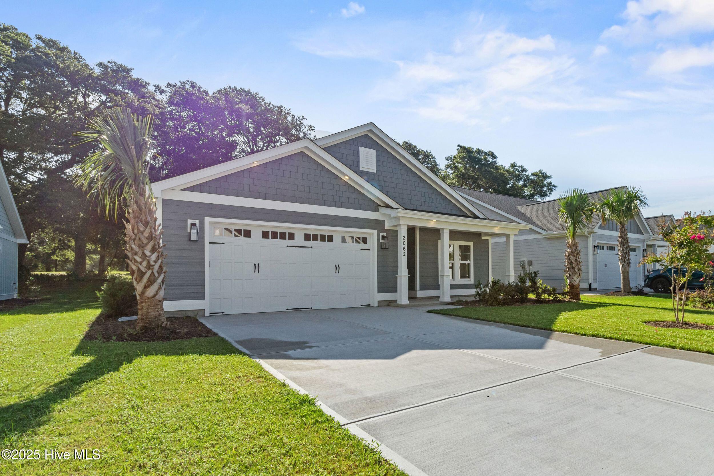 2062 Greenside Manor Drive SW, Ocean Isle Beach, NC 28469 – photo 3: 4_front exterior
