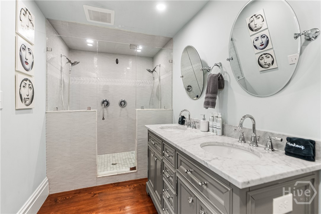 Walk-in tiled shower.