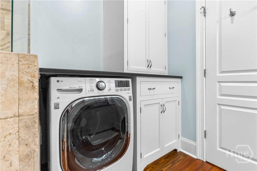 Ensuite laundry with included washer and dryer.
