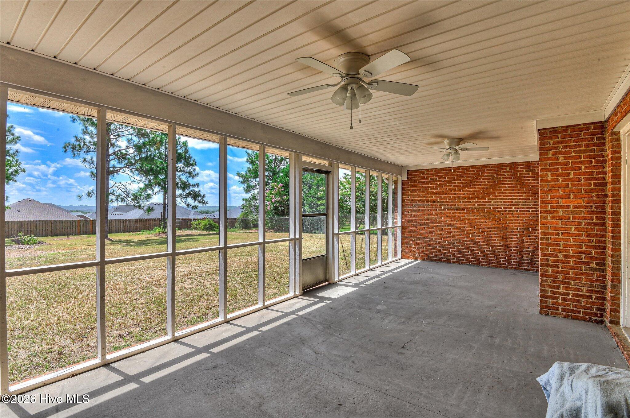 Screen porch with double ceiling fans