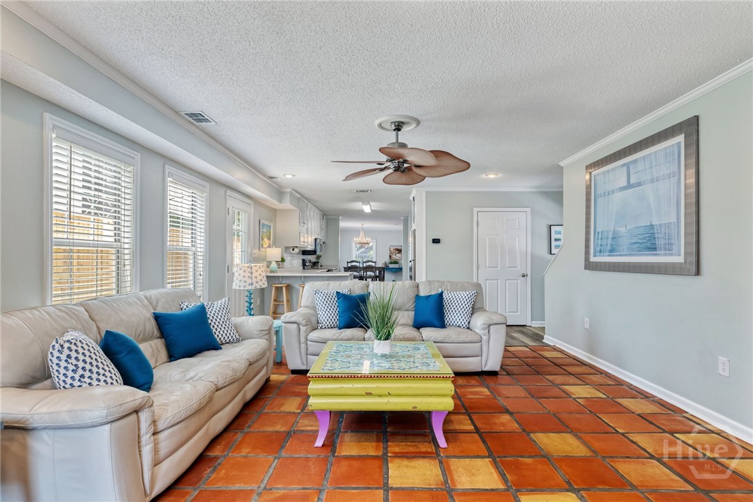 Spacious Living Room with Spanish Tile, Natural Li
