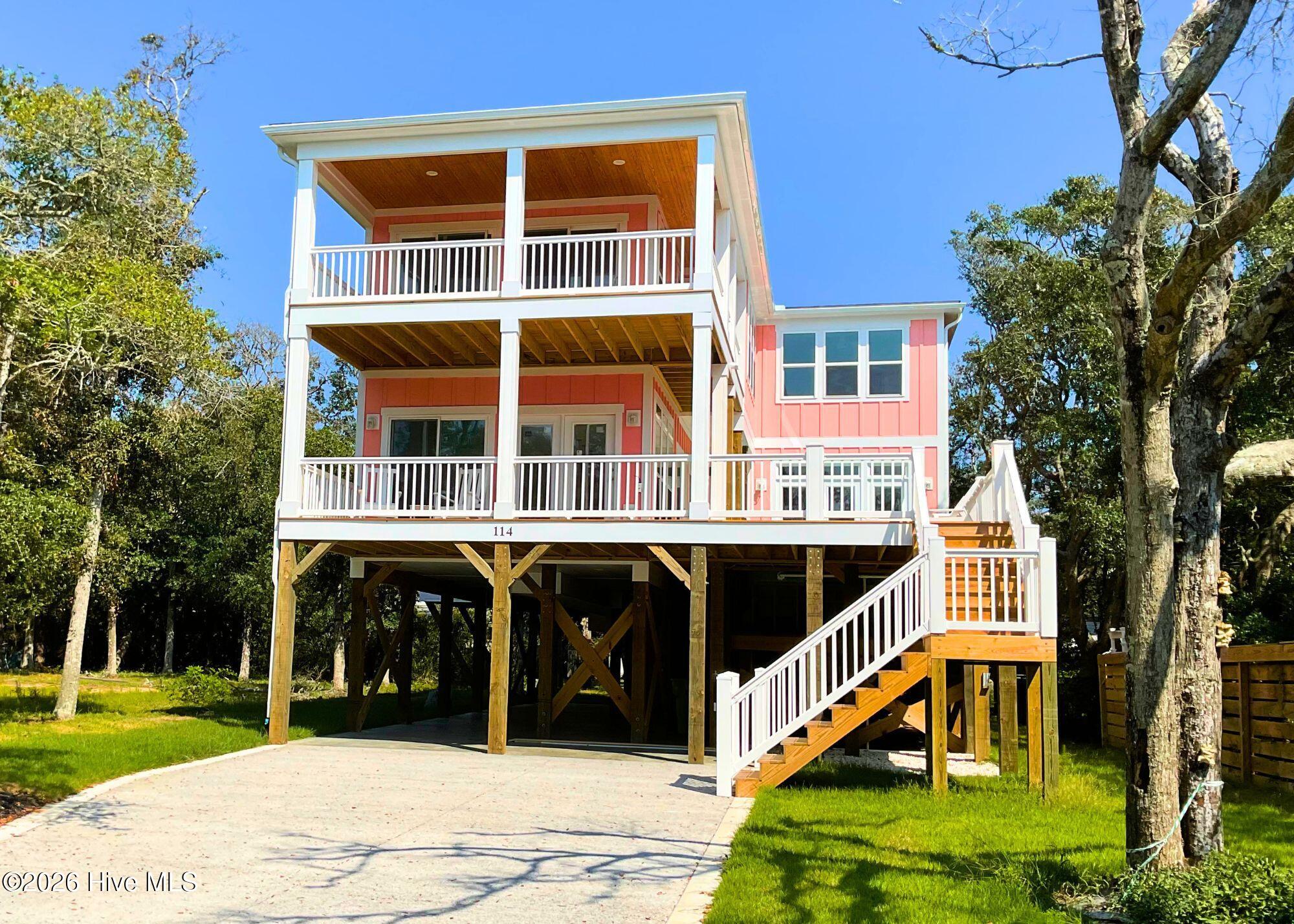 Photo 2 of Single family home for sale at 114 Se 75th Street, Oak Island, NC 28465 | MLS# 100535613 | Listing updated on 2026-09-03