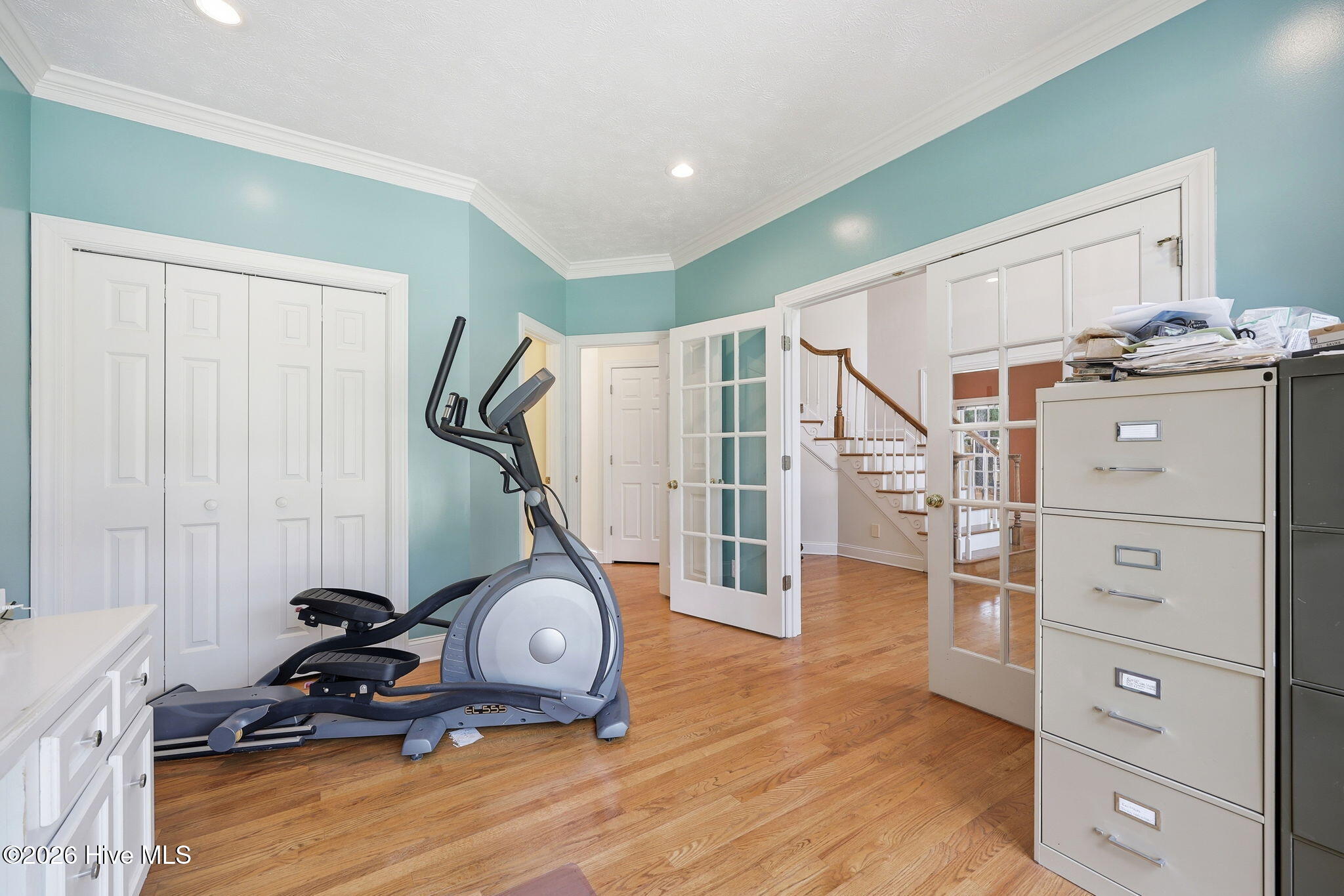 downstairs bedroom with full bath--- *used as an office with glass french doors