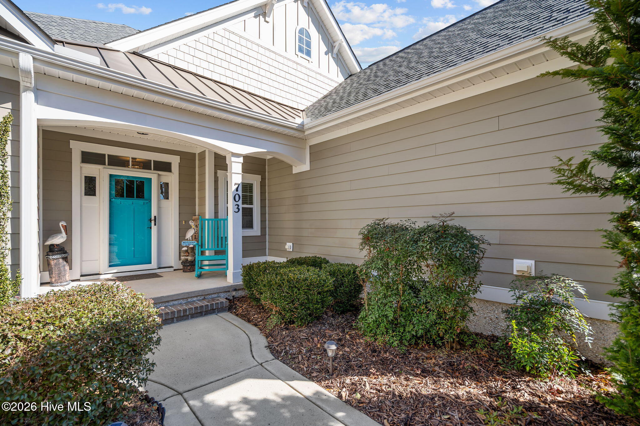 703 Brown Pelican Lane, Hampstead, NC 28443 – photo 8: 64-web-or-mls-Photo Feb 12 2026, 11 49 5