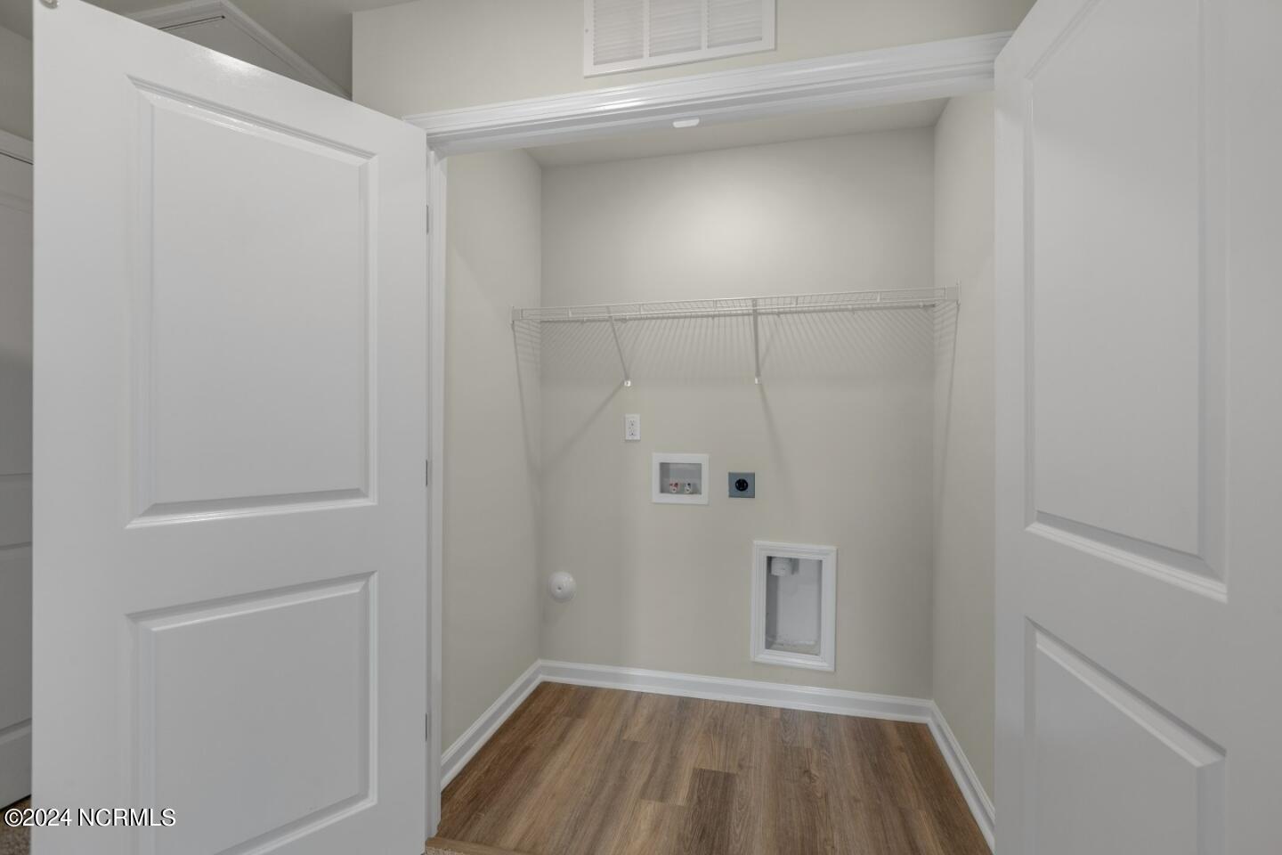 7098 Dunford Road Unit 130, Leland, NC 28451 – photo 19: Laundry Closet