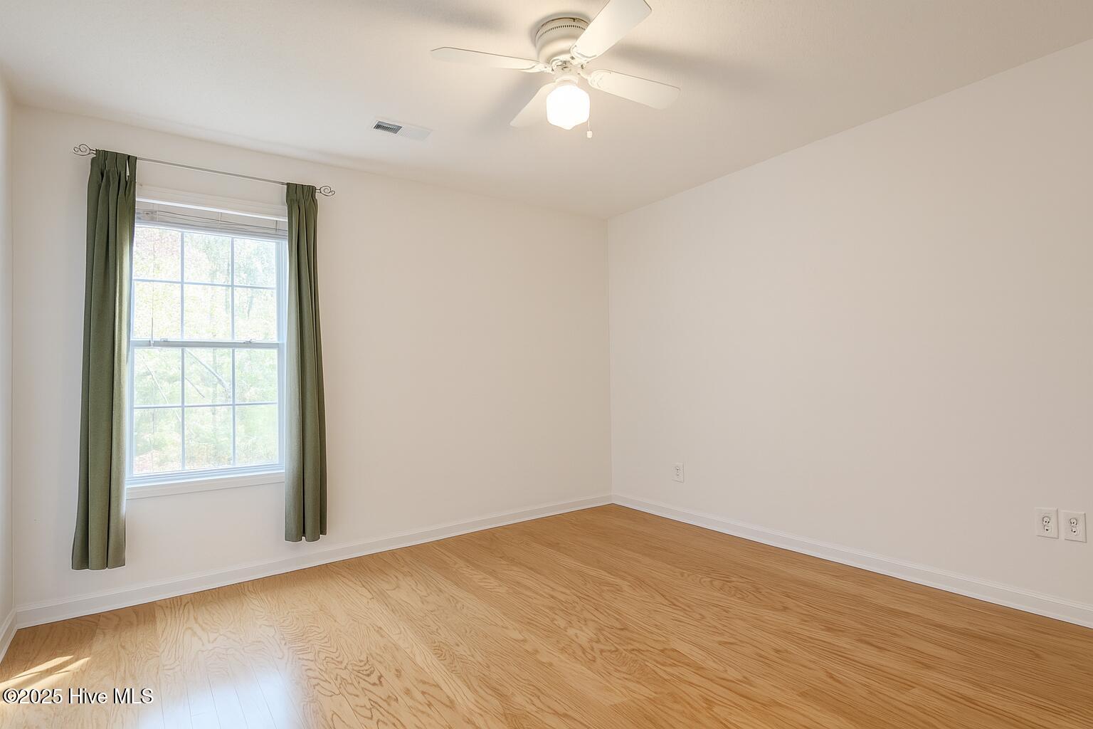 9117 Landing Drive SW, Calabash, NC 28467 – photo 18: Bright and Serene Bedroom Space