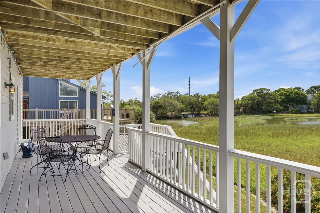 deck with beautiful lagoon and marsh view