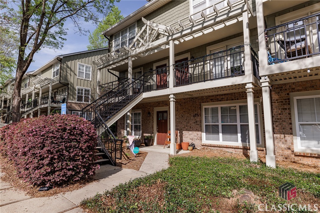 Unit 110 of Brookewood Mill Condominiums has the winning trifecta - End Unit, Ground Floor, and available for fall occupancy in 2025! The current owner-occupants have updated flooring with luxury vinyl plank in living areas and the secondary bedroom. New HVAC in November 2024! Because this is a ground floor end unit, the living area has twice the windows of a typical condo, so there is much more natural lighting. The Primary Suite features an attached bathroom. Off the kitchen via French Doors is a quaint patio for grilling. Brookewood Mill is a quiet community with gated entry, community pool, mature landscaping, and a bus stop at the entry to the complex. Additionally, a new entry point for the North Oconee River Greenway is half a block from the unit. New Kroger, Publix, and UGA Veterinary Teaching Hospital are super close as well!