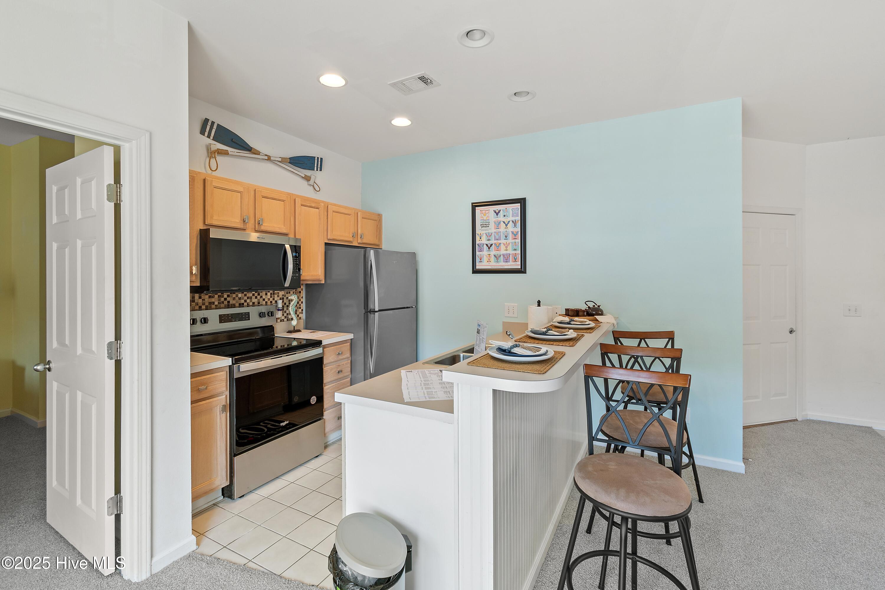 205 Royal Poste Road 2807, Sunset Beach, NC 28468 – photo 6: Kitchen Bar