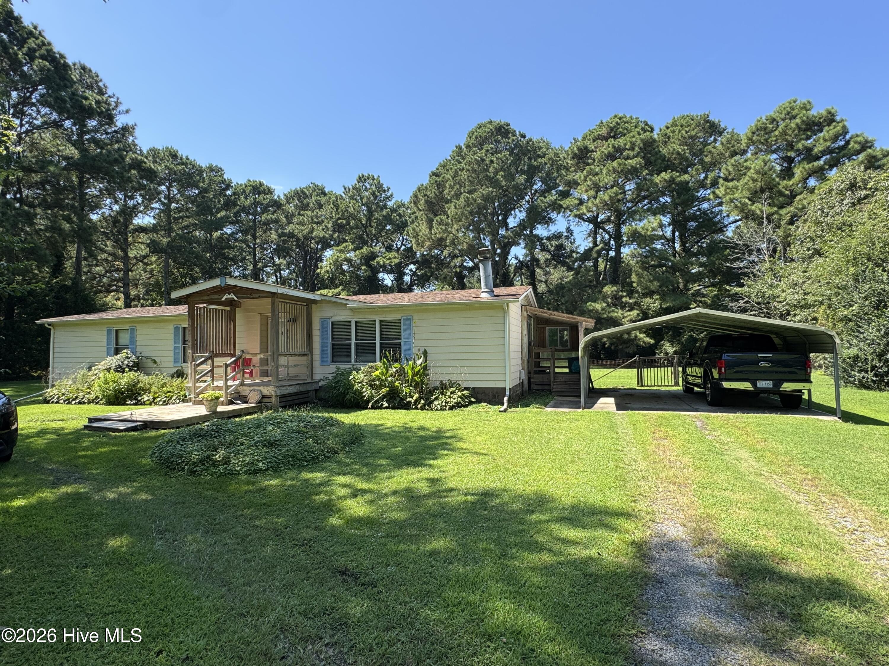 Exterior photo of 103 Cowboy Trail, Moyock, NC 27958. MLS: 100600259