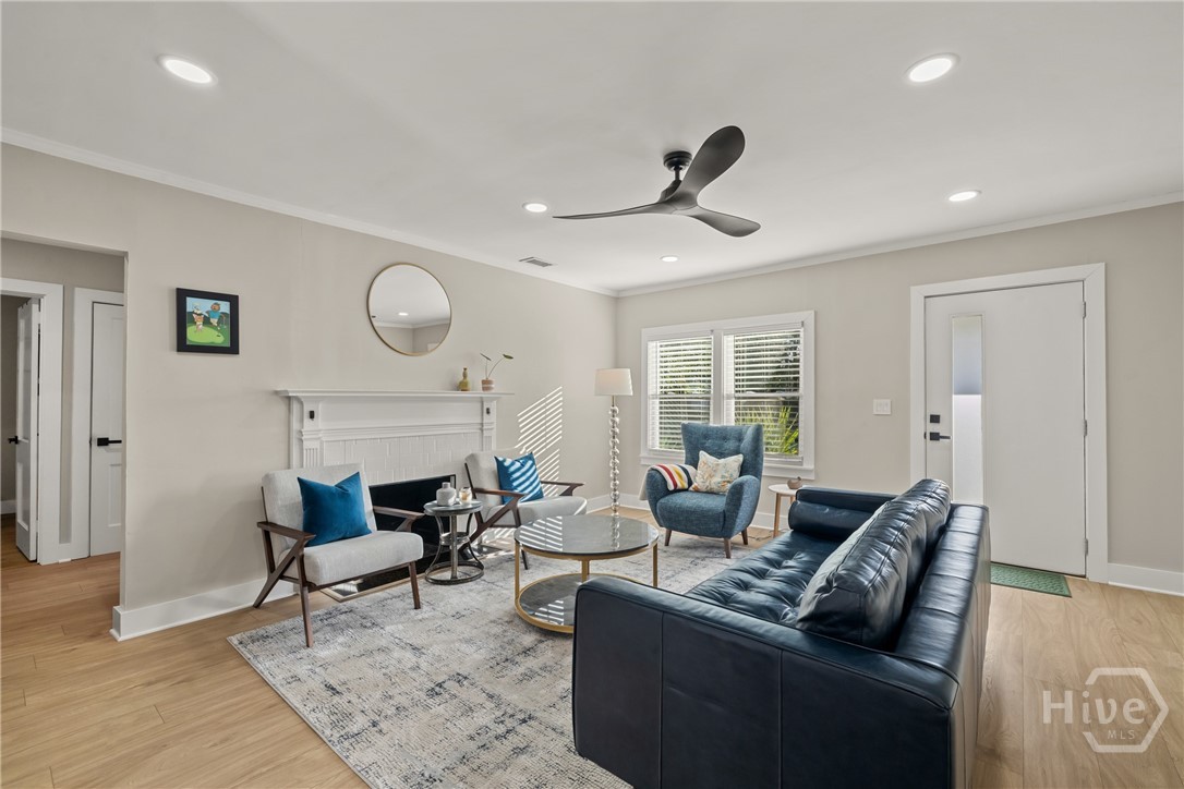 Living room with front door entry