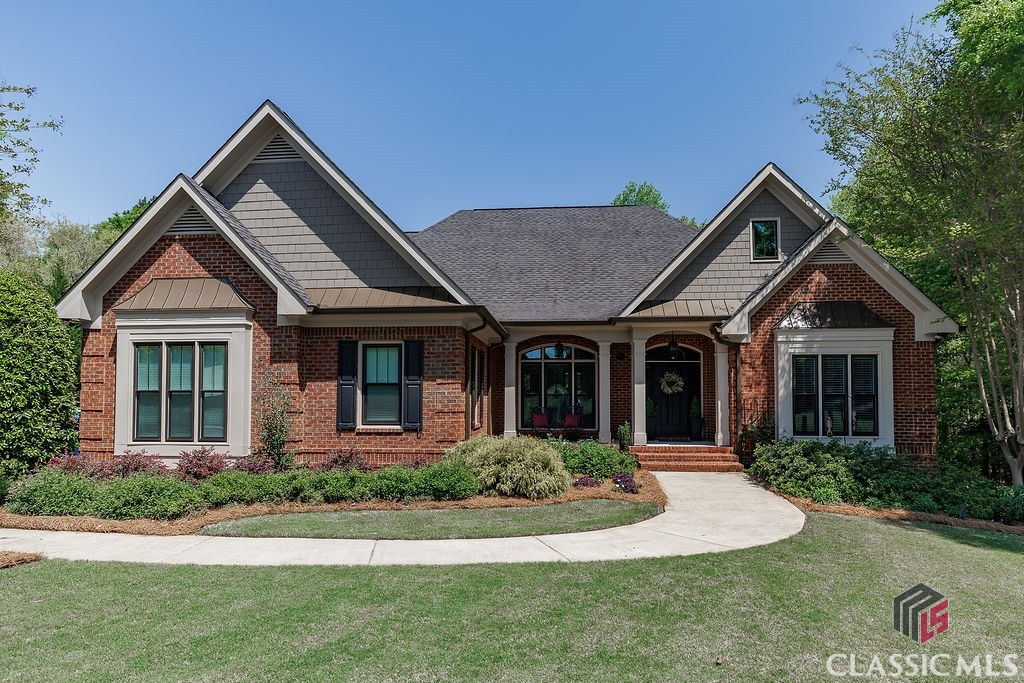 Tucked into a private, tree-lined acre, this exceptional home delivers the best of both worlds—an Athens address with Oconee County schools, the space you crave beyond Five Points, and a meticulous level of detail that sets it apart. Designed with precision (one of the sellers is an engineer, and it shows), this home has been thoughtfully upgraded from top to bottom, offering timeless, understated elegance and modern convenience.Inside, the layout is as spacious as it is intentional. The main level is bathed in natural light, with soaring ceilings and a renovated chef’s kitchen featuring crisp white cabinetry, an oversized 82” x 42” island, and dramatic matte black and white textured granite. Walls were strategically removed in the kitchen and basement to enhance flow, making this home feel open, connected, and effortlessly livable. A dedicated home office with custom built-ins offers a stylish, functional workspace, while the primary suite provides a remarkable private escape, featuring a custom-tiled shower, updated fixtures, and a newly organized walk-in closet. A private door leads directly from the suite to the deck, offering a natural extension of the living space.Three distinct levels create flexibility for multi-generational living, guests, or a growing family. The upstairs bonus suite—with its own private bath—creates a secluded haven, while the finished basement delivers the ultimate in-law or teen suite, complete with a bedroom, full bath, and expansive living areas. Luxury vinyl plank flooring and new doors throughout the lower level add a fresh, updated feel. Plus, there’s nearly 350 square feet of unfinished basement space—perfect for a workshop, storage, or future expansion.This home includes 4 full bathrooms and 2 half baths, ensuring privacy and convenience for everyone. For effortless entertaining, the main level and basement each feature a half bath, making hosting easy without sacrificing private spaces.Beyond the aesthetic upgrades, the home’s infrastructure has been completely refreshed. All 52 windows have been replaced, three of the four full bathrooms have been fully renovated, and four new HVAC units ensure comfort in every season. And that’s just the beginning—a full list of upgrades is on file.Outside, the brand-new deck invites you to unwind in peaceful seclusion, surrounded by mature trees. Beyond the yard, a wooded expanse provides space to explore—the current owners even set up an archery range. Whether you dream of adventure, a hidden fort, or just extra room to roam, this unique feature adds an unexpected bonus.Located just minutes from Epps Bridge shopping, UGA, in-town Athens, and Watkinsville, this home is truly a rare find—a blend of Five Points style with the space and top-tier schools of Oconee County. xxhttps://youtu.be/FuwxGQ02naQ
