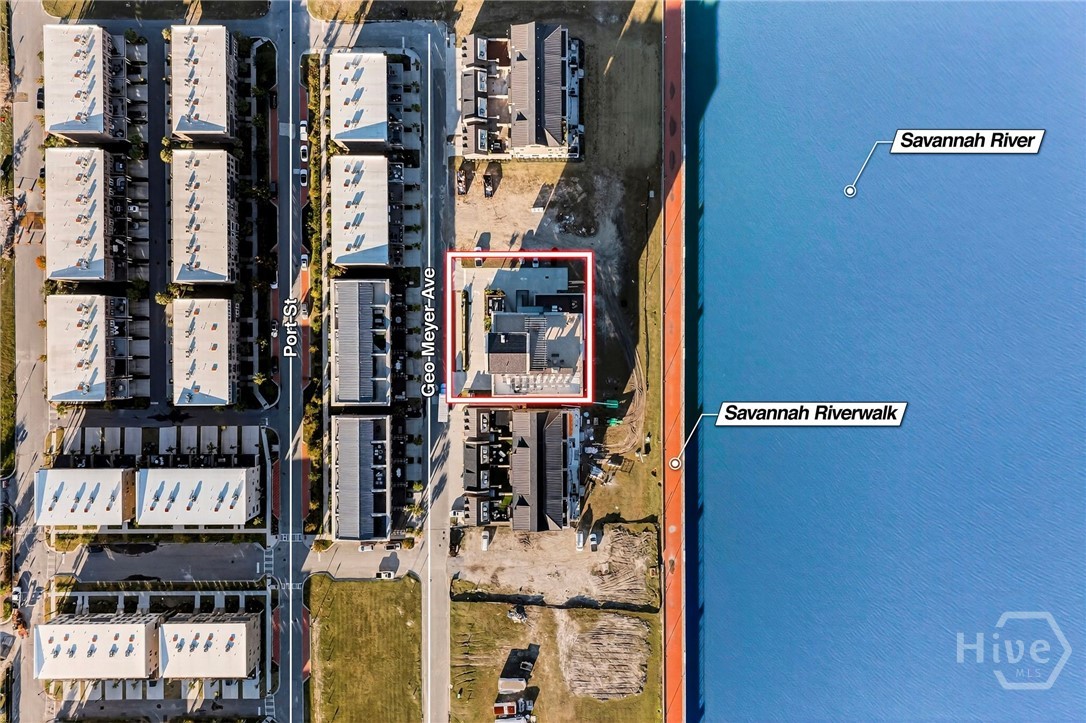 Aerial View of Prime Riverfront Property - The Mayors is positioned steps from the Savannah Riverwalk, this distinguished parcel offers unmatched proximity to waterfront leisure, urban vibrancy, and historic charm.