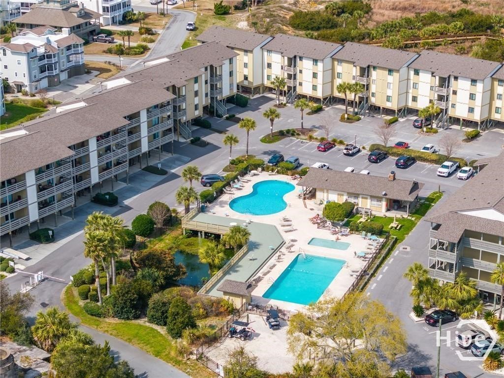 Aerial view of complex and pool