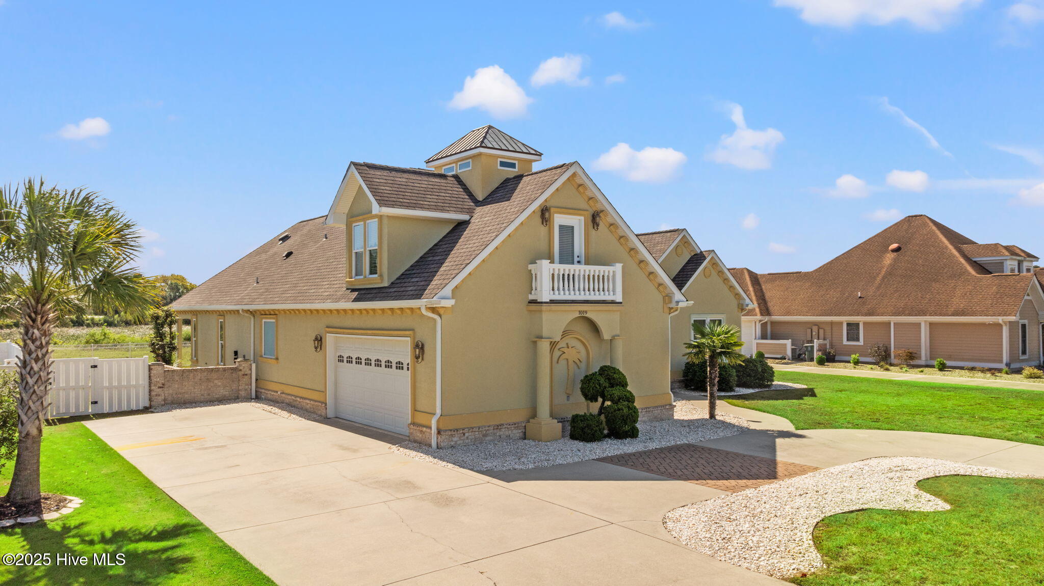 Left elevation showing 2 car garage
