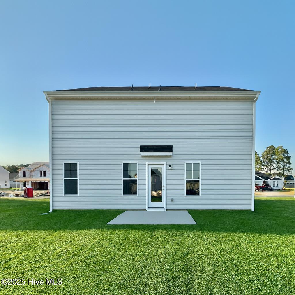 Suburban House with Vibrant Lawn