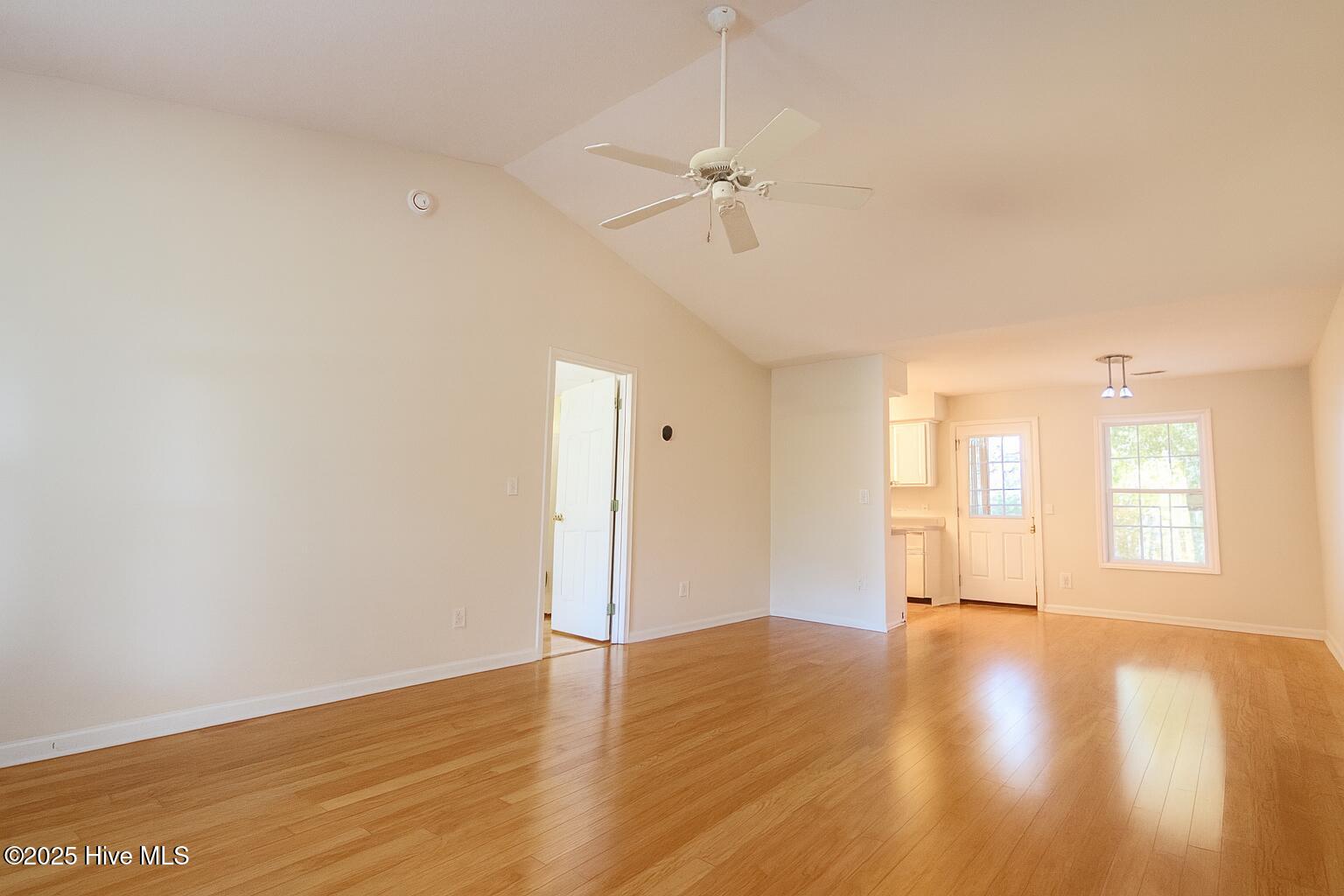 9117 Landing Drive SW, Calabash, NC 28467 – photo 23: Bright Open-Concept Living and Kitchen