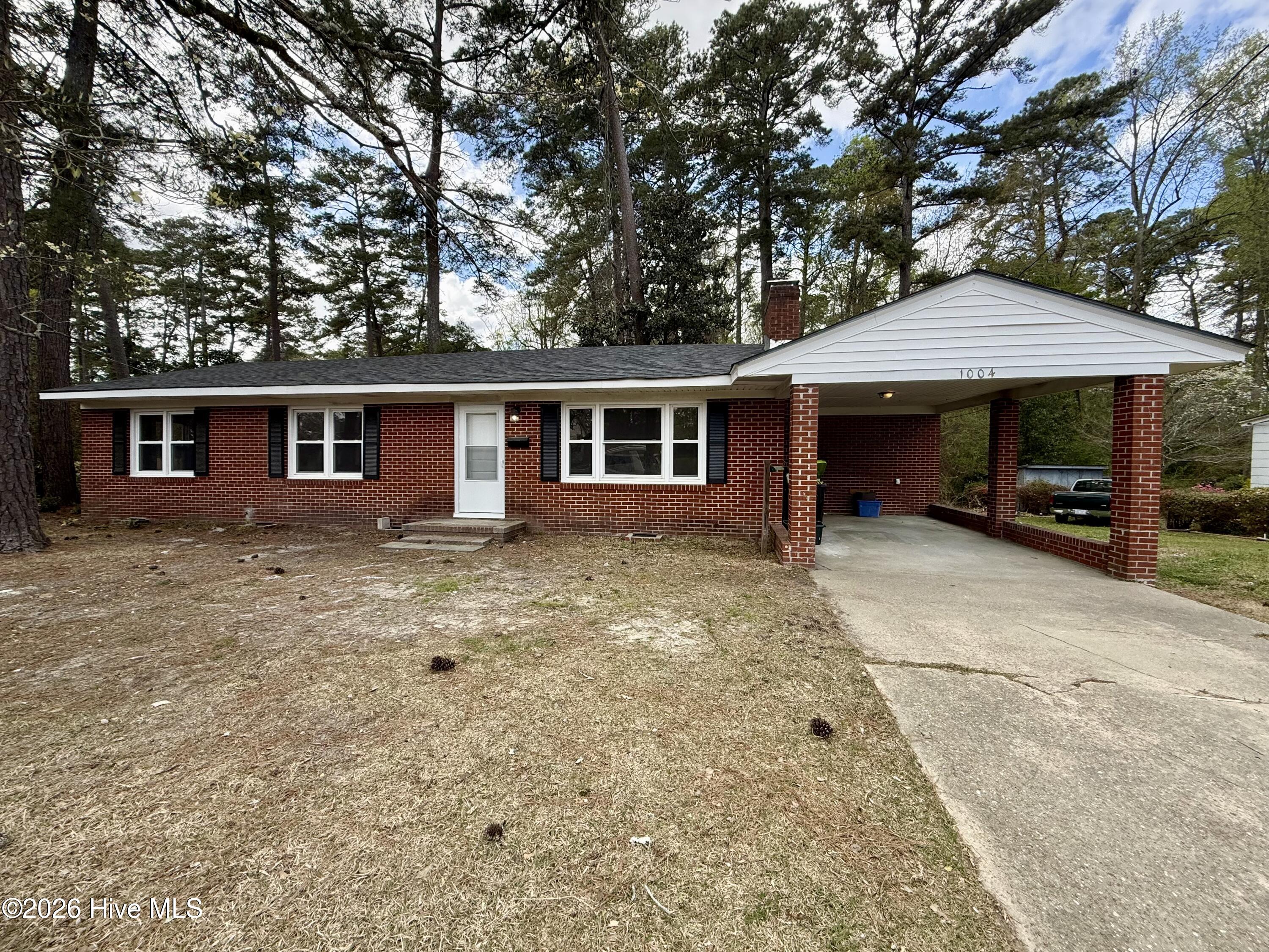 Discover the potential in this charming 3-bedroom, 2-bath starter home situated on a corner lot. Recent updates include durable LVT flooring throughout much of the home, offering a fresh and modern feel. The kitchen opens nicely to the dining area and features tile flooring along with updated appliances, creating a functional space for everyday living and entertaining. The bedrooms are generously sized, and both bathrooms are equipped with step-in showers, including a private en-suite in the primary bedroom. Additional features include city water and sewer, an electric HVAC system, an attached carport, a detached storage outbuilding, and an exterior utility room with laundry area. Located in a flood zone. Call today to schedule your private showing.