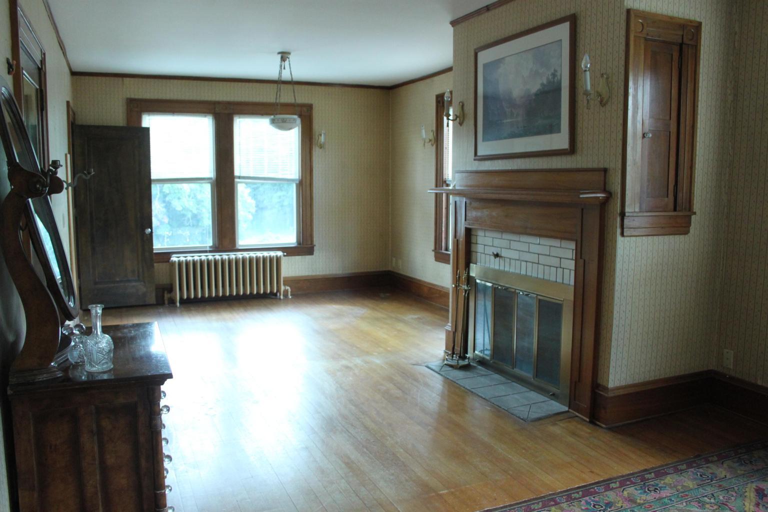 2nd floor living room or office with working fireplace.