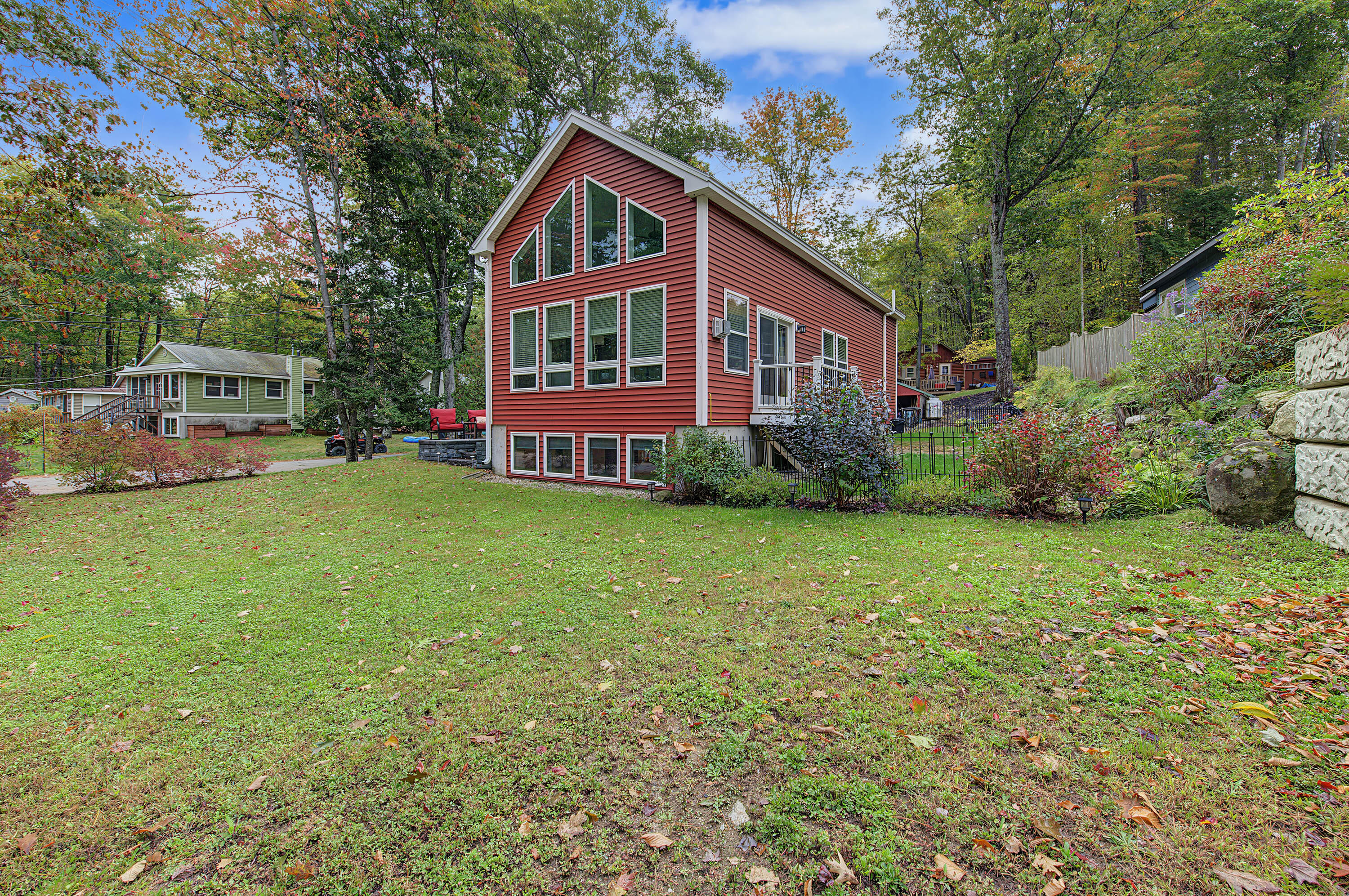 Looking to join the lake life. come check this home out. Perched on a small knoll looking out over Little Sebago Lake. Two 40 foot right aways one is across the camp road. Moor your boat off shore and pick up and drop off at the dock. Paddle your kayak on the calm waters of this beautiful body of water. Fish for bass, trout and more right across the road. Little Sebago Lake is well known for its sense of community and character with islands, coves and sandbars. Listen to the loons call across the water each night or watch one of our bald eagles. This custom home is tastefully appointed with hardwood, tile, soaring cathedral ceilings and an open floor plan. Amazing primary bedroom with custom built-ins and walk in closet.