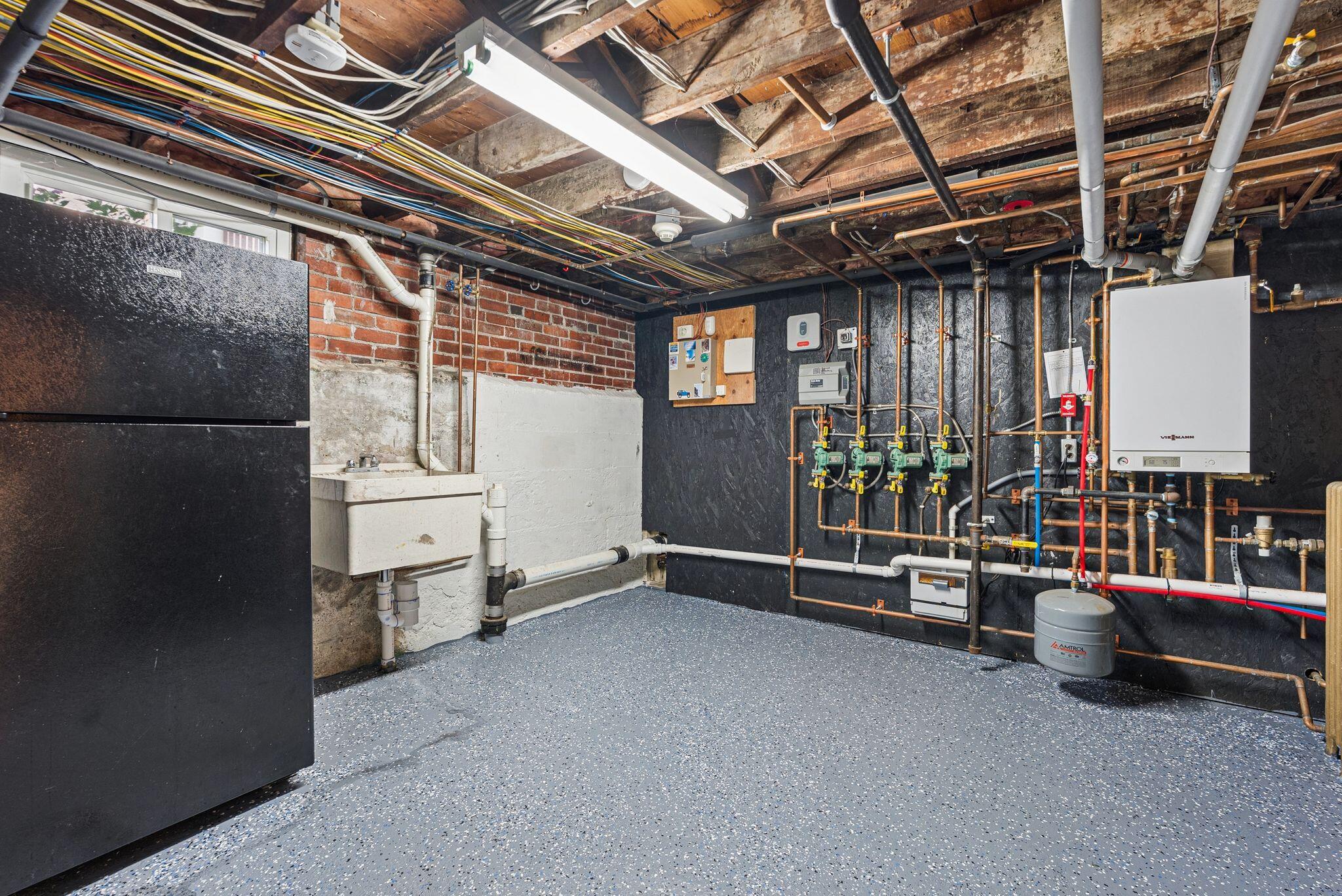 43 Pennsylvania Avenue, South Portland, ME 04106 Basement utility room has plenty of space for extra storage.