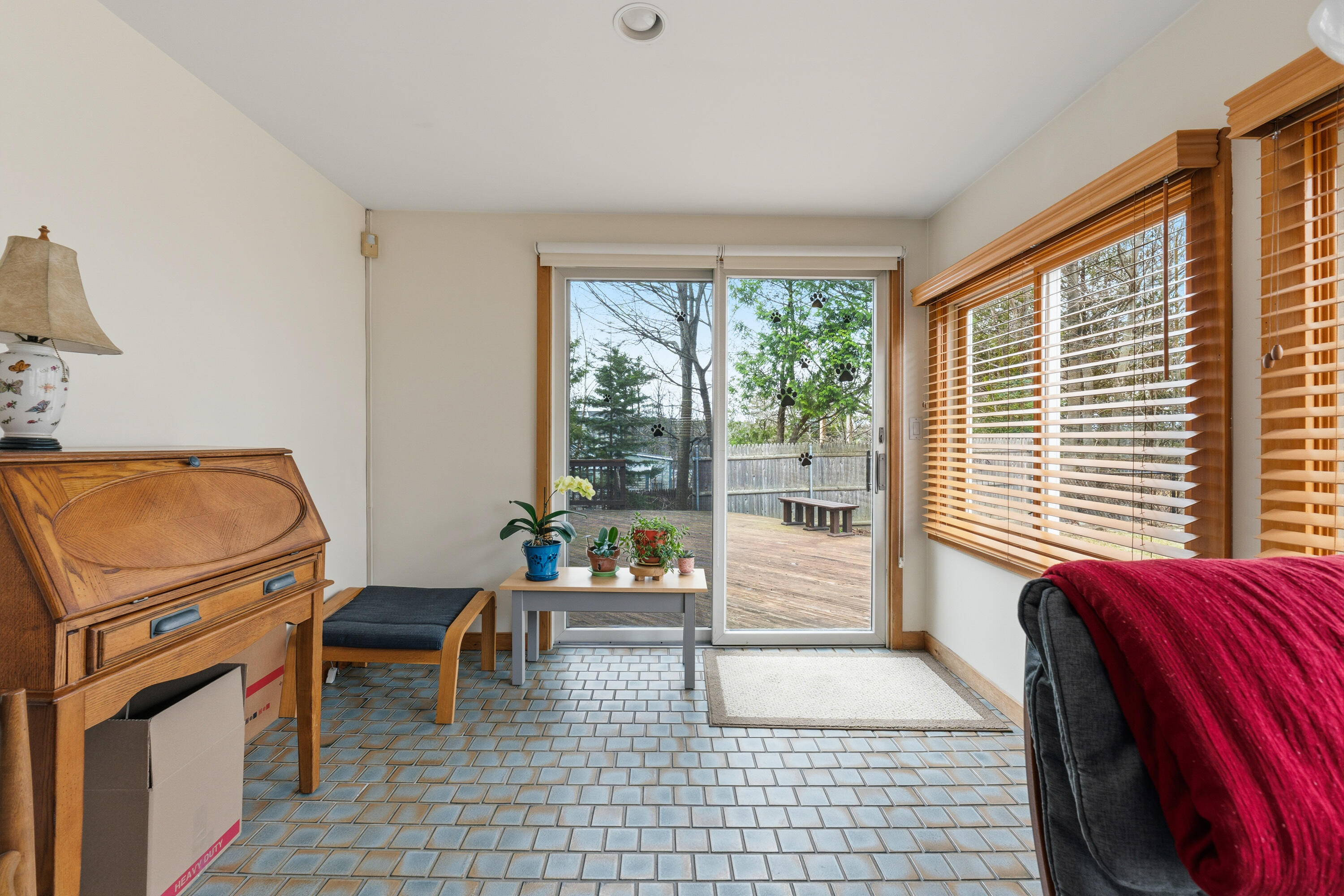 14 Blaine Avenue, Augusta, ME 04330 Sunroom off kitchen and fenced in yard
