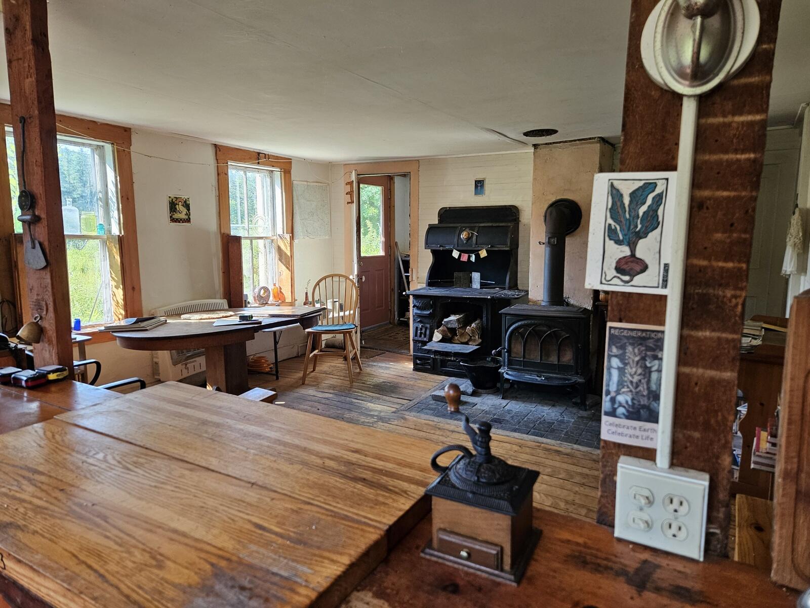 Opposing view of the dining room with entry in back-ground backgound